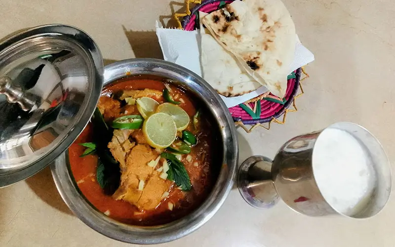 Easy Chicken Curry (Shorba) Recipe for Busy Moms 1 chicken curry in a silver pot